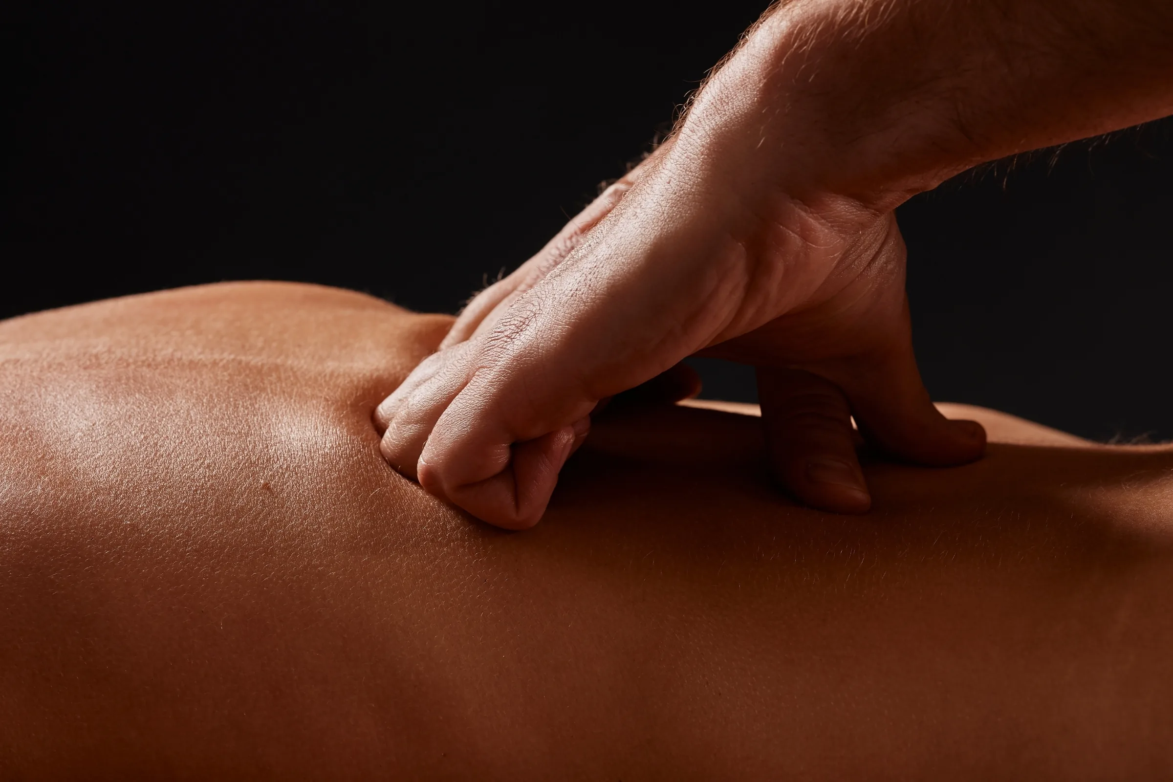 A calm, professional massage therapy room in Dumont